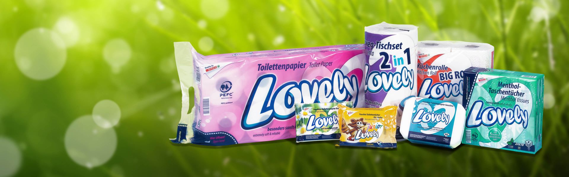 Lovely Produkte auf Grashintergrund