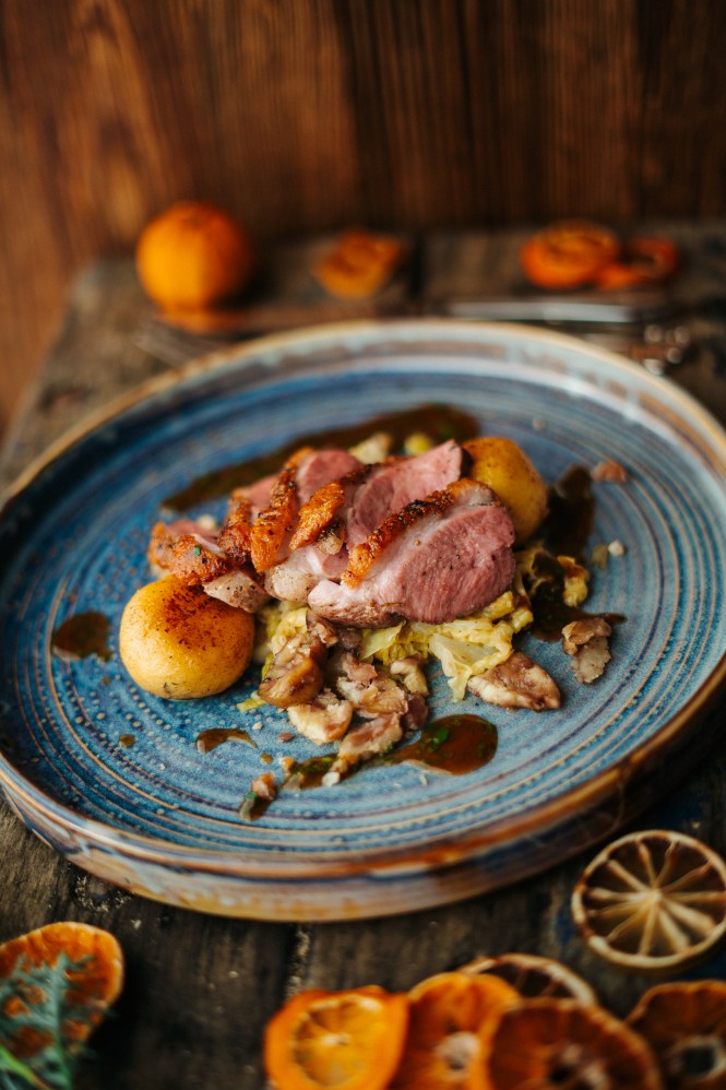 Ente mit Rahmwirsing und flaumigen Griessknöderln