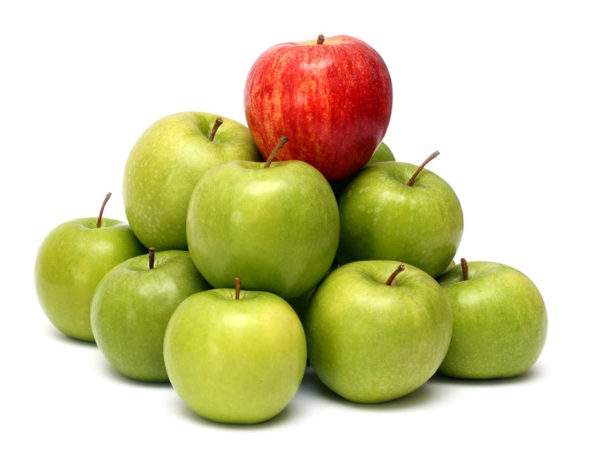 domination concepts with apples domination concepts - red apple between green apples