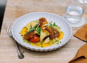 Erdäpfelschmarrn auf Tomatencarpaccio