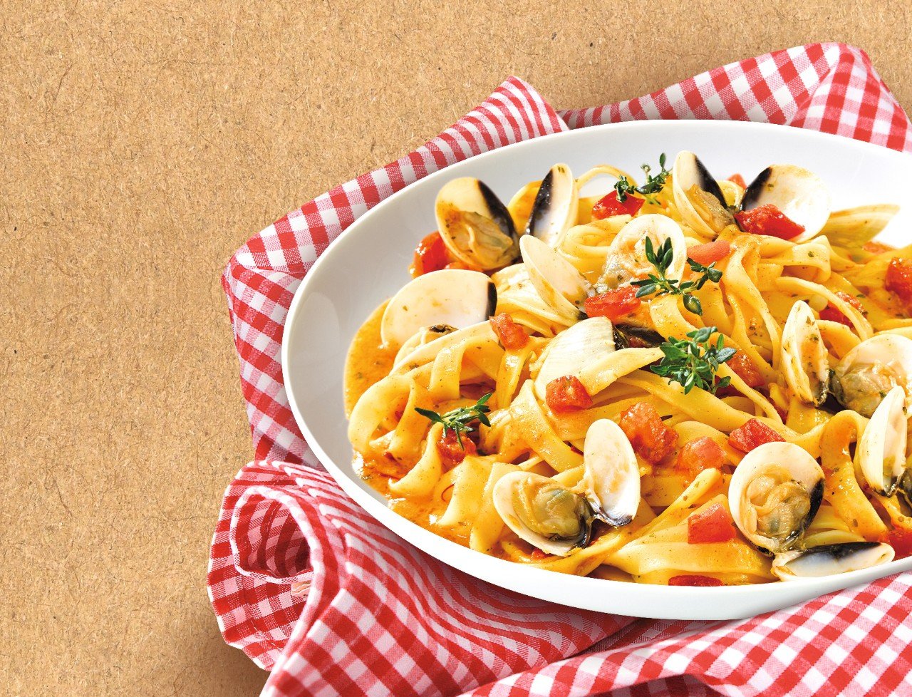 Tagliatelle mit Venusmuscheln » Rezept | SPAR Mahlzeit! Tagliatelle mit Venusmuscheln » Rezept | SPAR Mahlzeit!